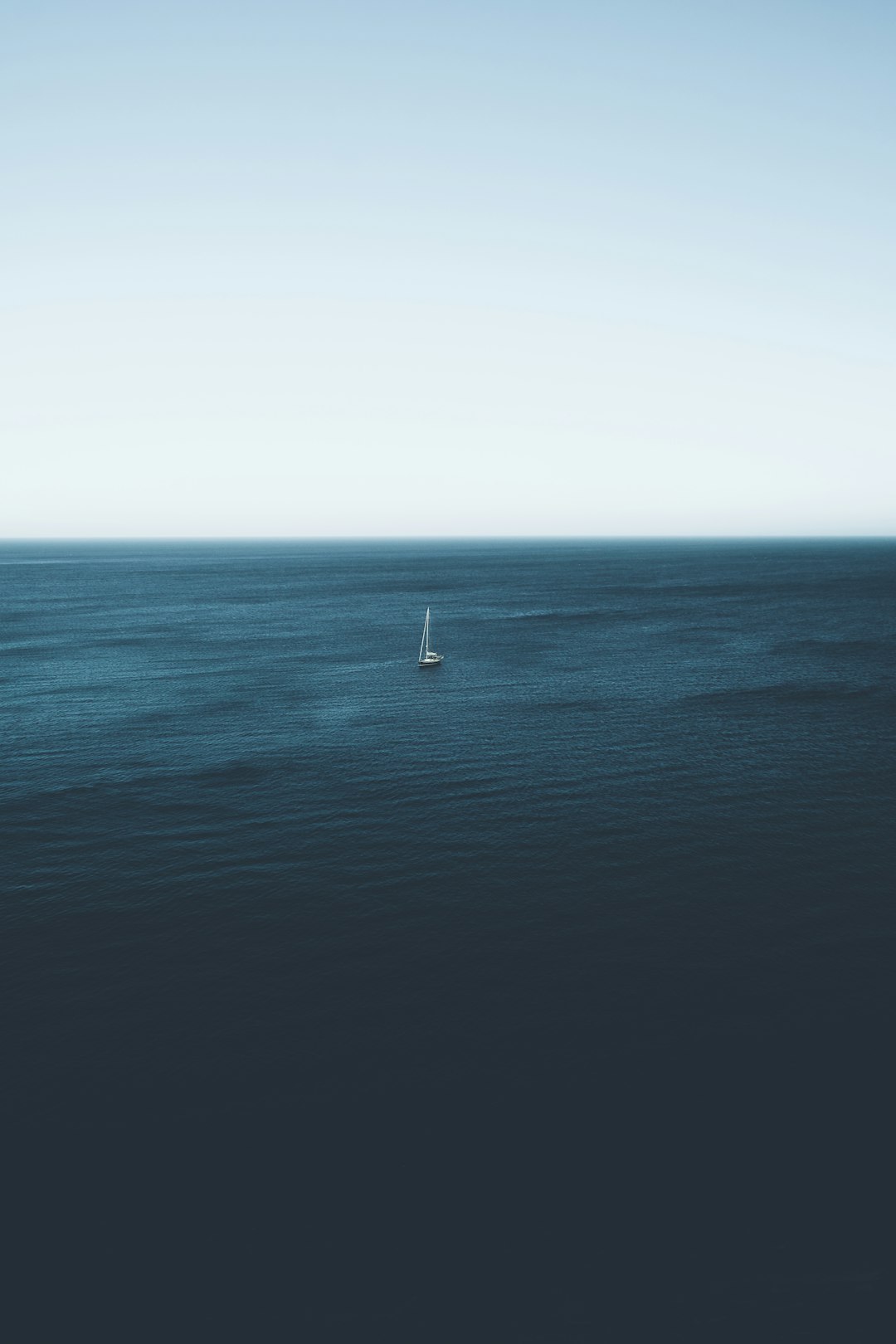sailboat on body of water during daytime