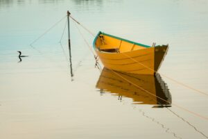 small fishing boat on a lake