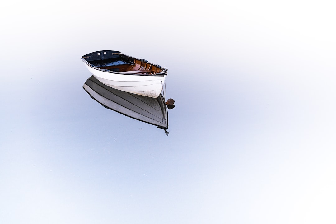 Conclusion by Boat Brands white boat on body of water
